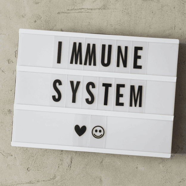 A board with the words immune system and a heart and smiley face depicting Is Your Immune System Stronger on a Plant-Based Diet?