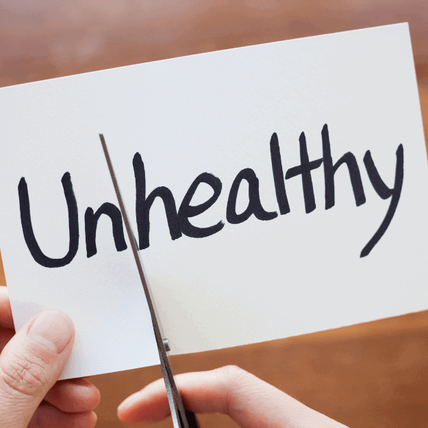 paper with the word unhealthy and someone cutting off the un depicting What About Nutritional Deficiencies with eating meat or no meat