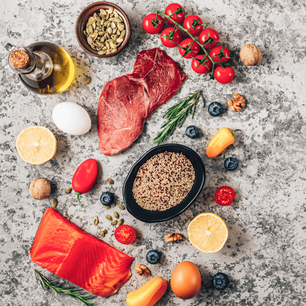 a variety of low carb foods such as meat salmon some vegetables