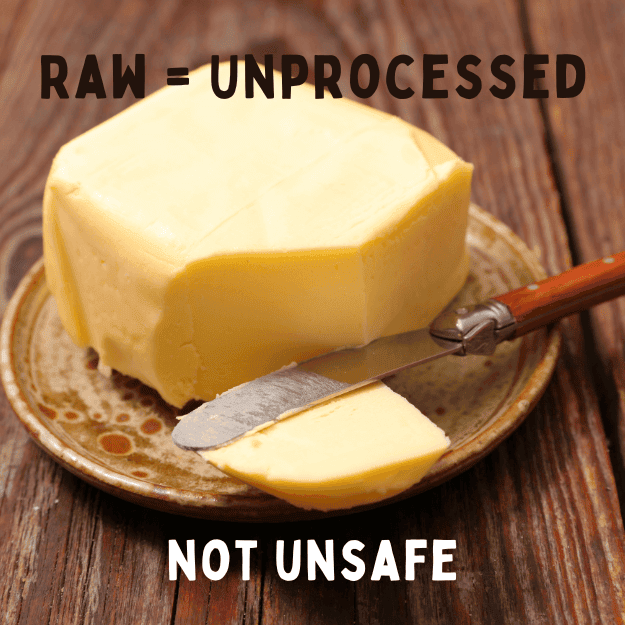 A block of butter with the words raw=unprocessed, not unsafe
