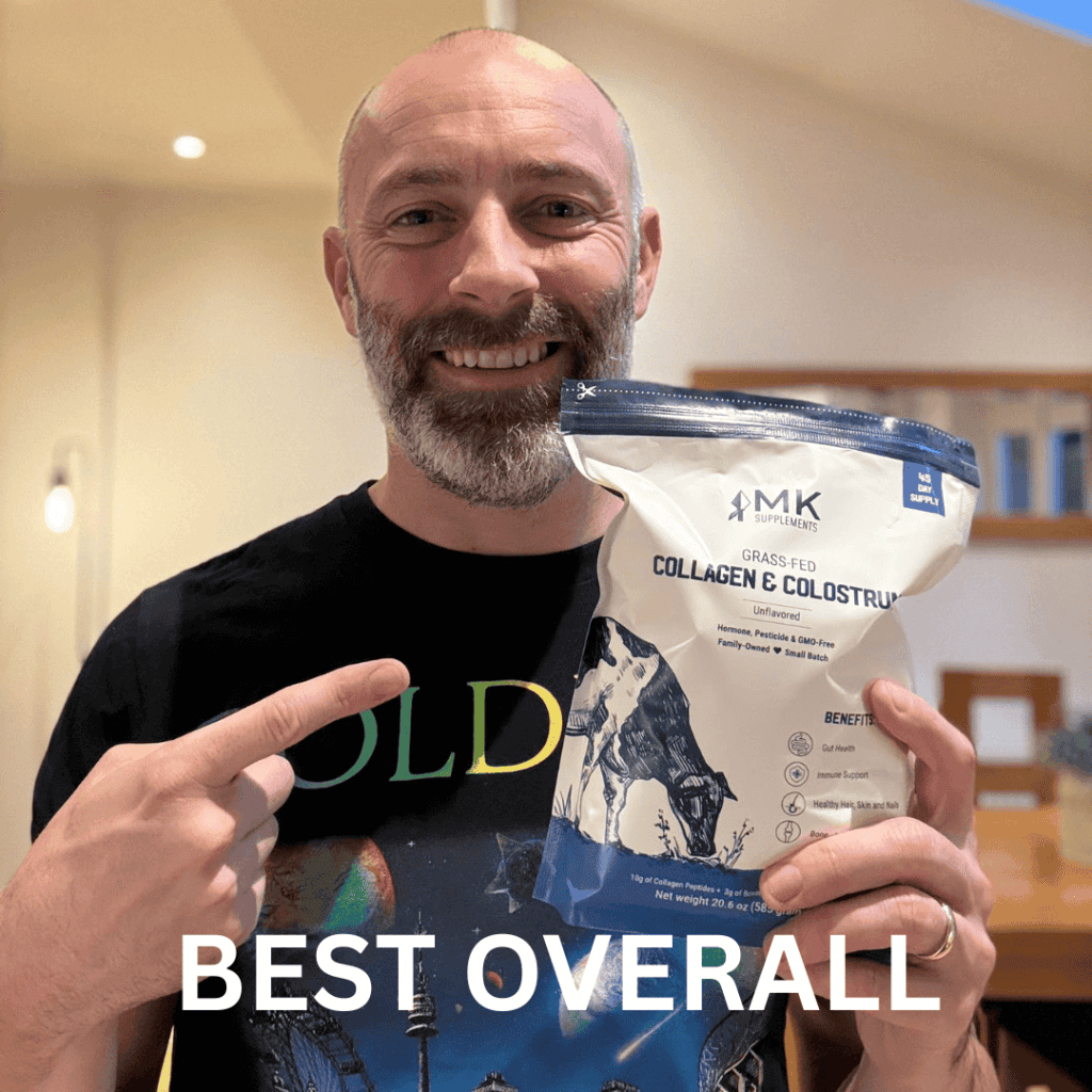 Me holding MK Supplements Collagen & Colostrum powder